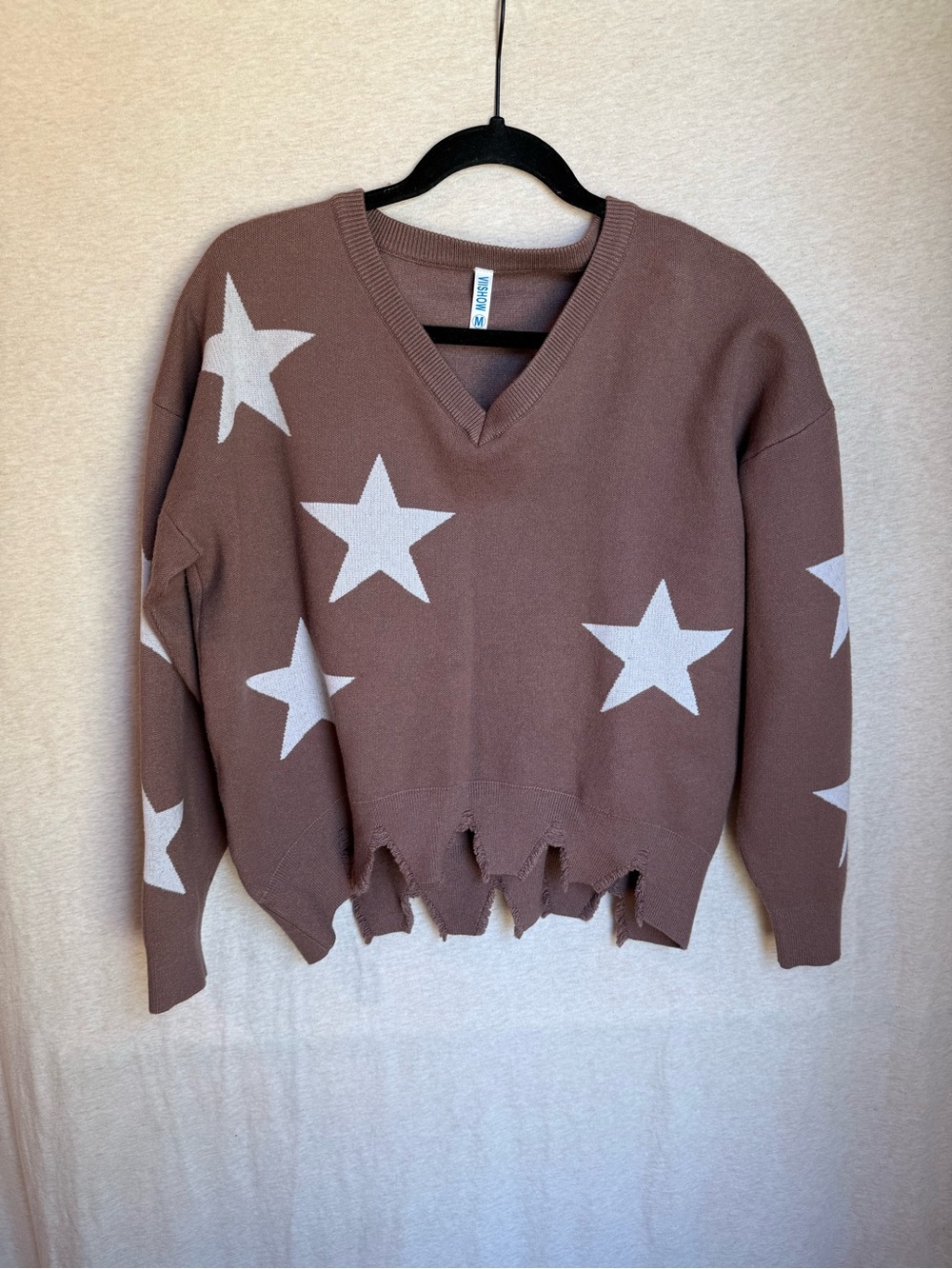 Distressed Star-Print V-Neck Sweater in Brown